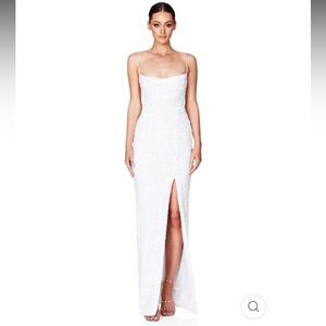 Purchased and never worn, brand new and with tags!